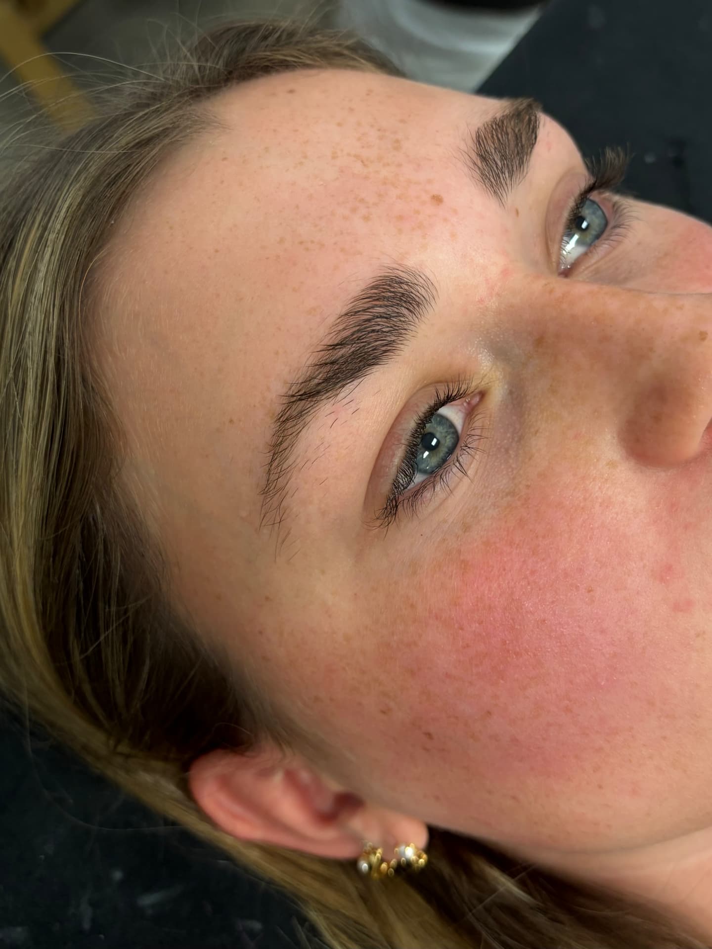 Brow lamination before and after — blonde client — before